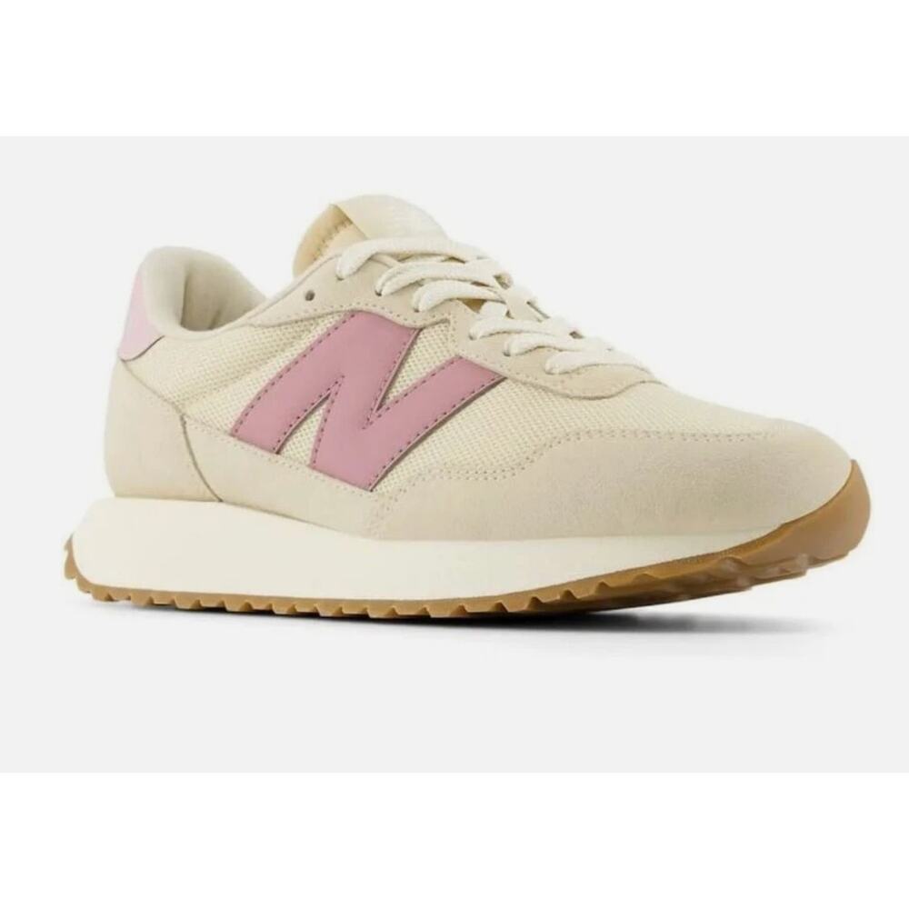 New Balance Women's 237 V1 Sneaker in a sea salt and pink
